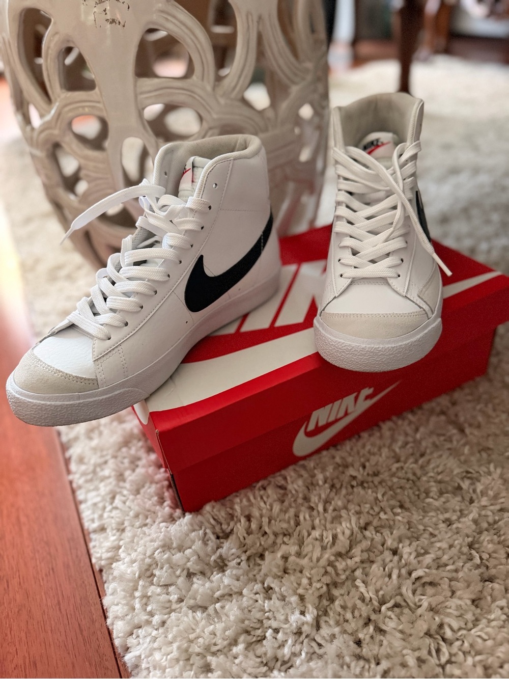 Nike White High-Top Sneakers with Black Swoosh Accent